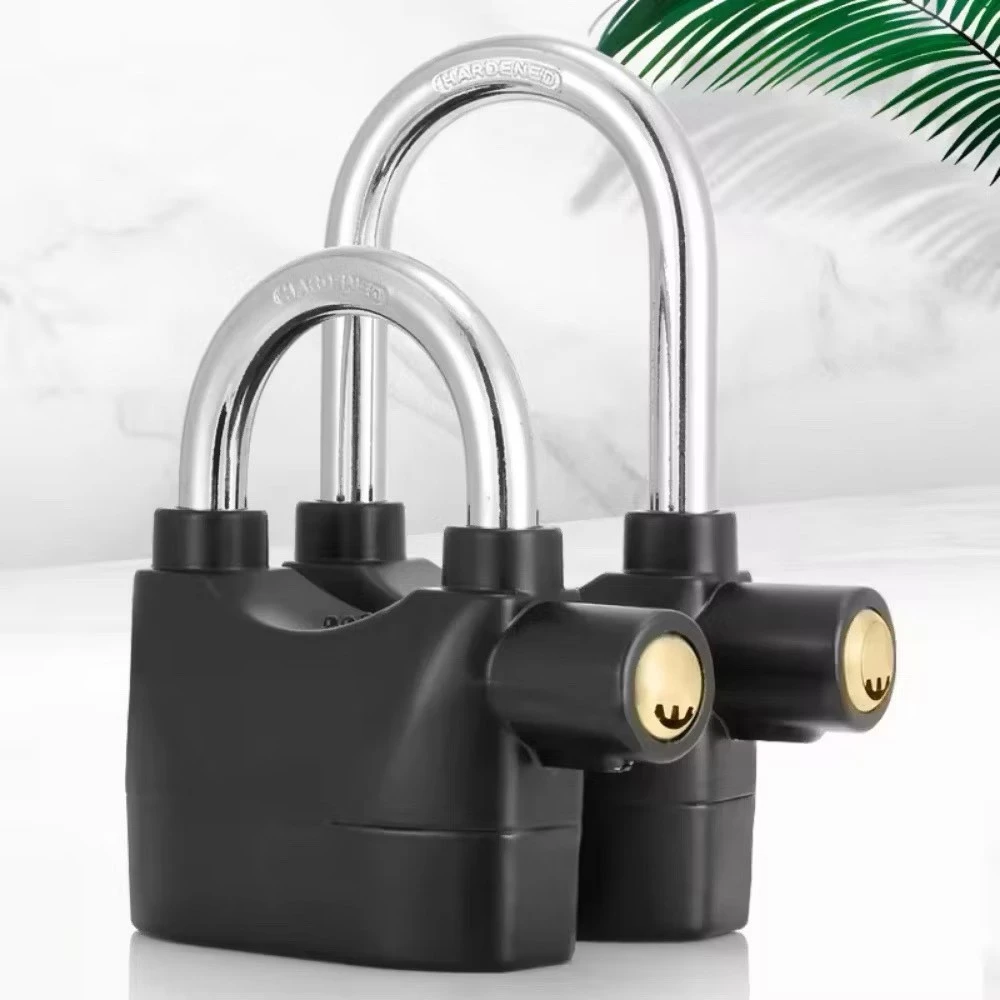 Anti-theft motorcycle lock with audible alarm